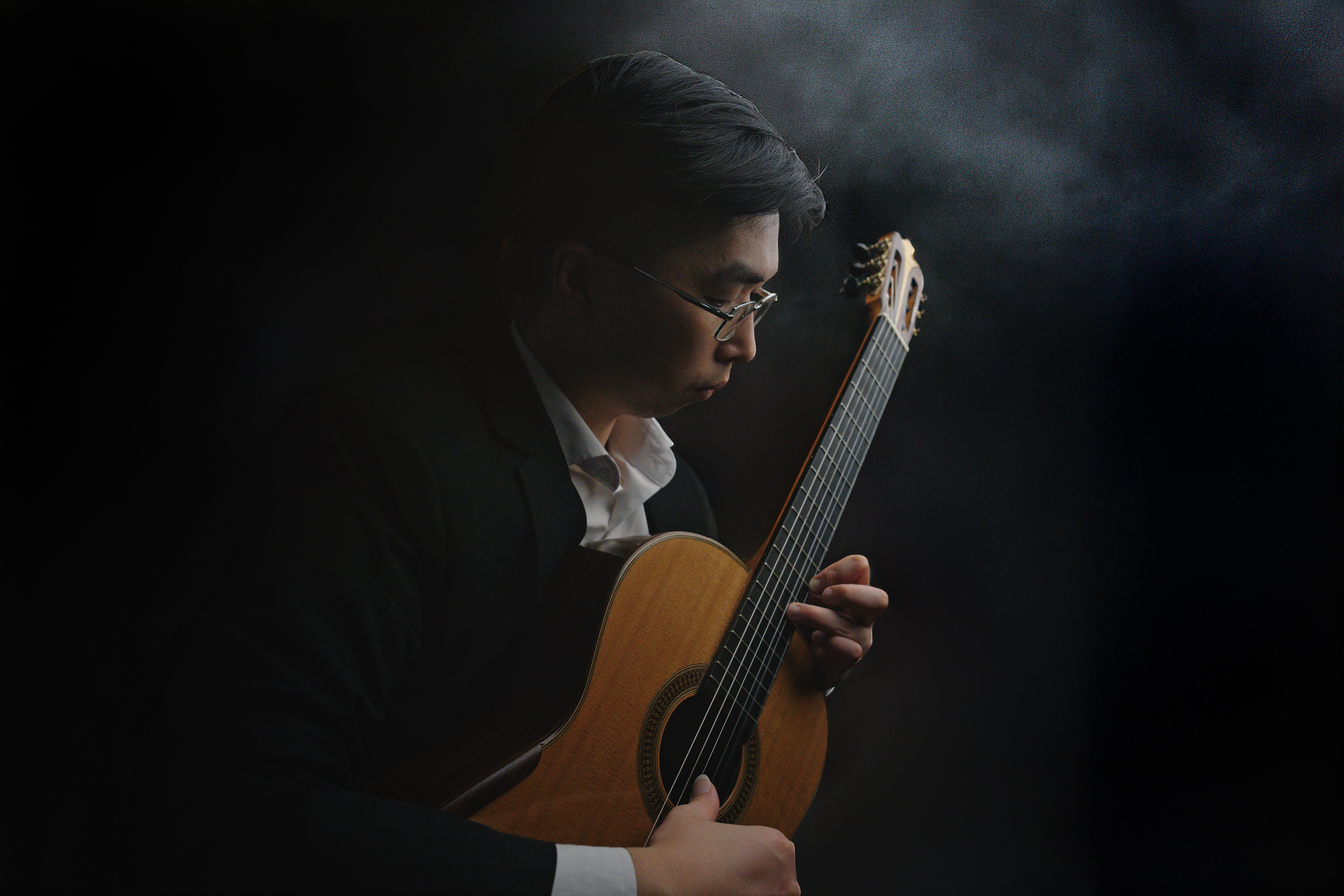Jeffrey Cheah performing classical guitar